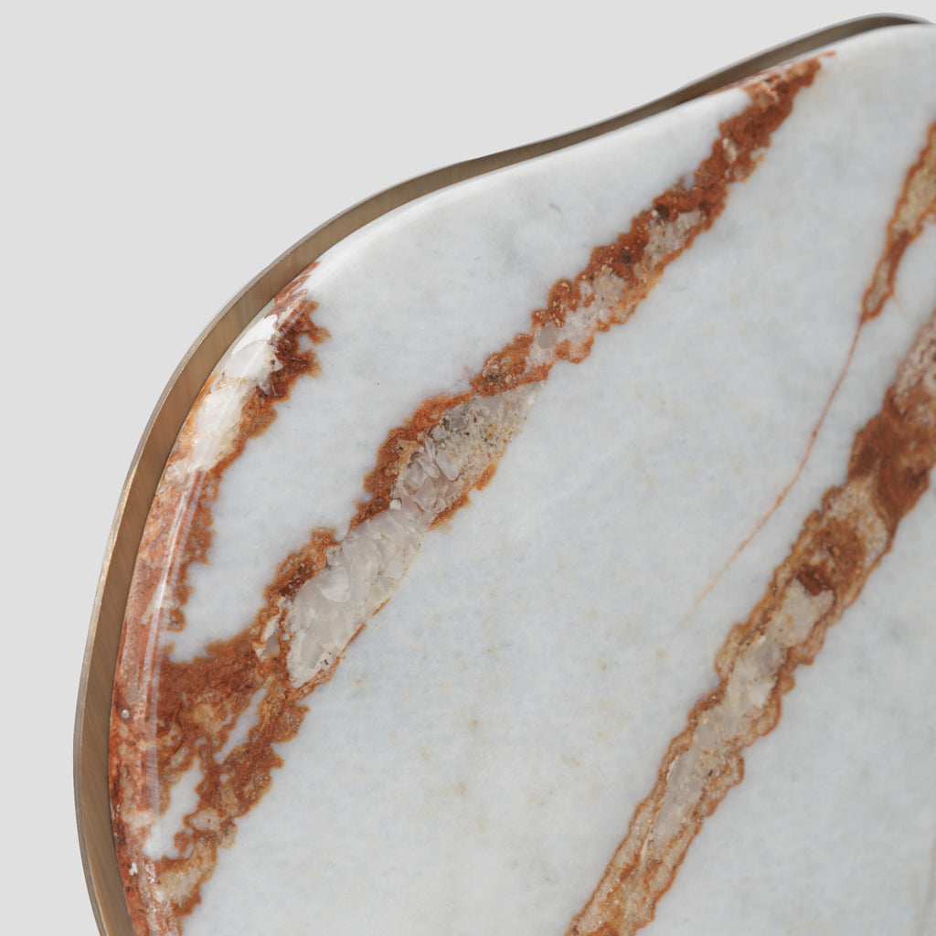 Istres side table with a shaped design and a marble tabletop